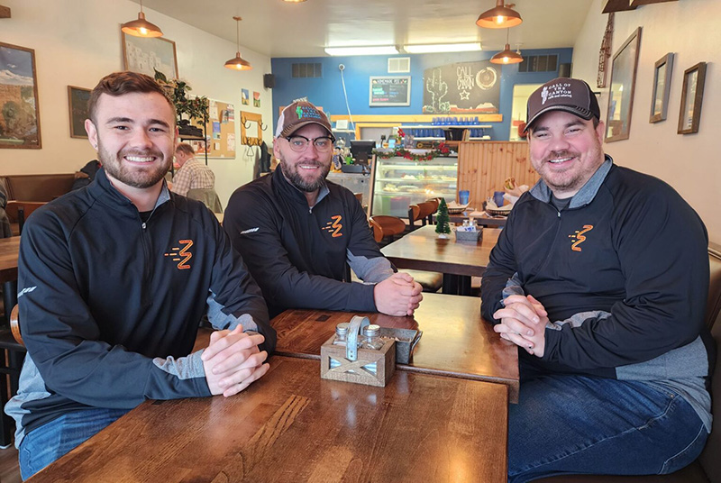 Tim, Ardy, and Cam having a meeting in Call of the Canyon.